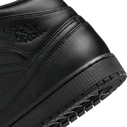 Black Air Jordan 1 Mid Trainers by Nike